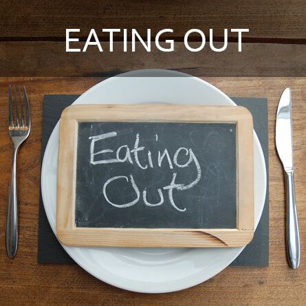 Sign saying eating out for dolgellau holiday cottages 