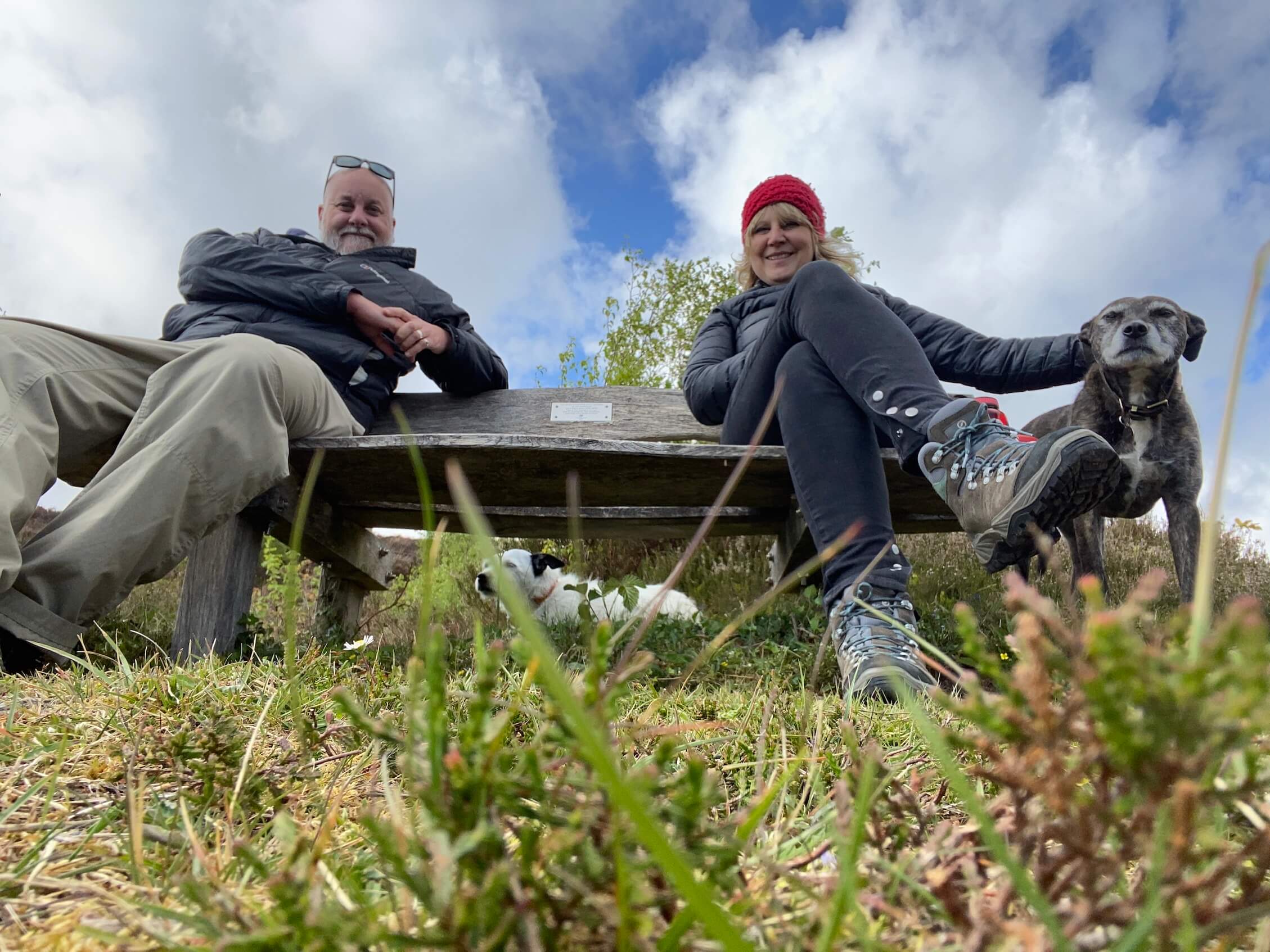 The founders sitting at the camp sites snowdonia bench