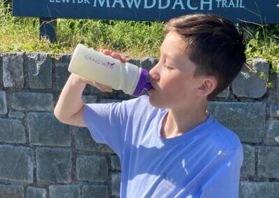 Boy using water bottle