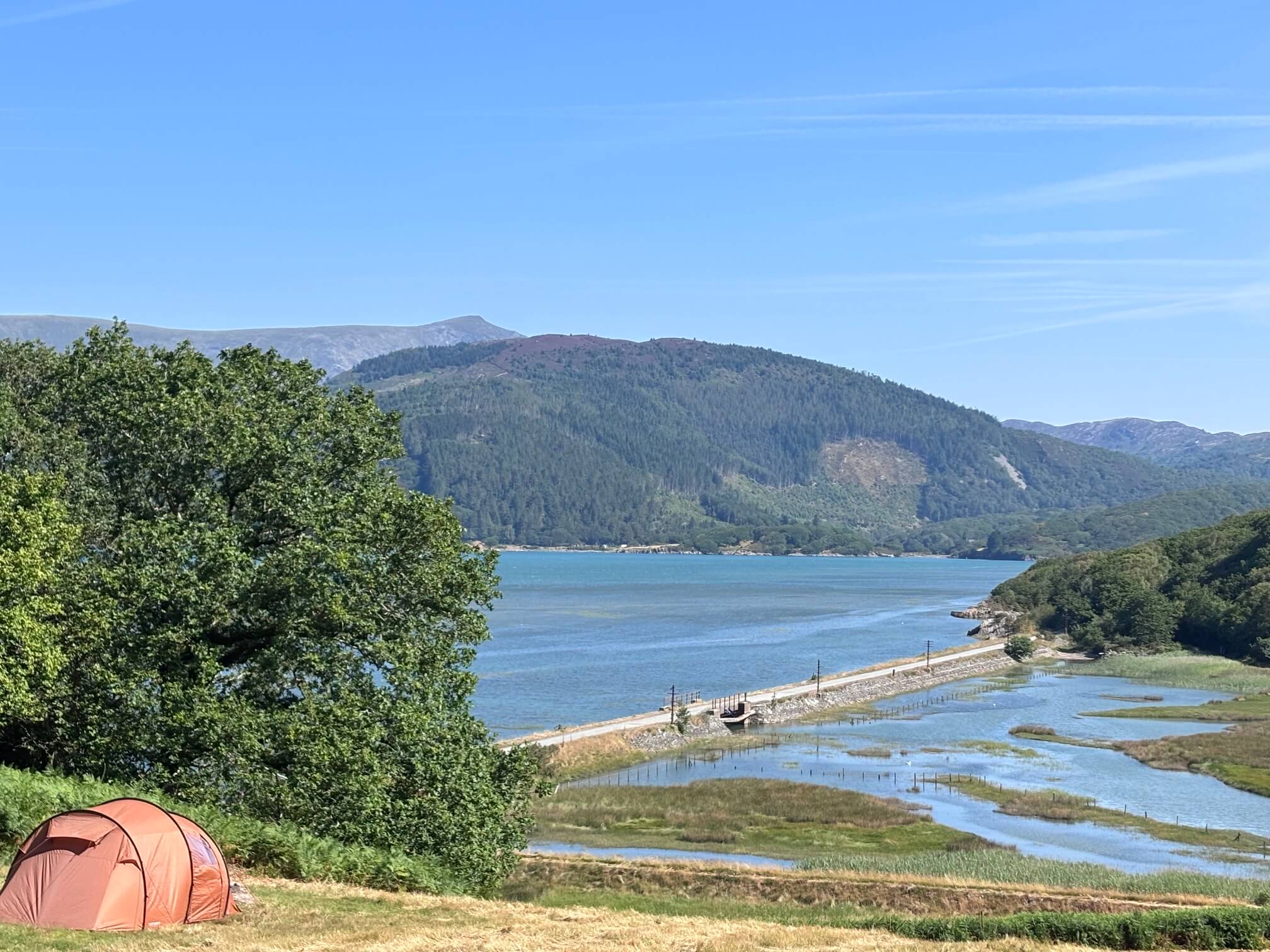 tent with high tide on Estuary, Wales camping